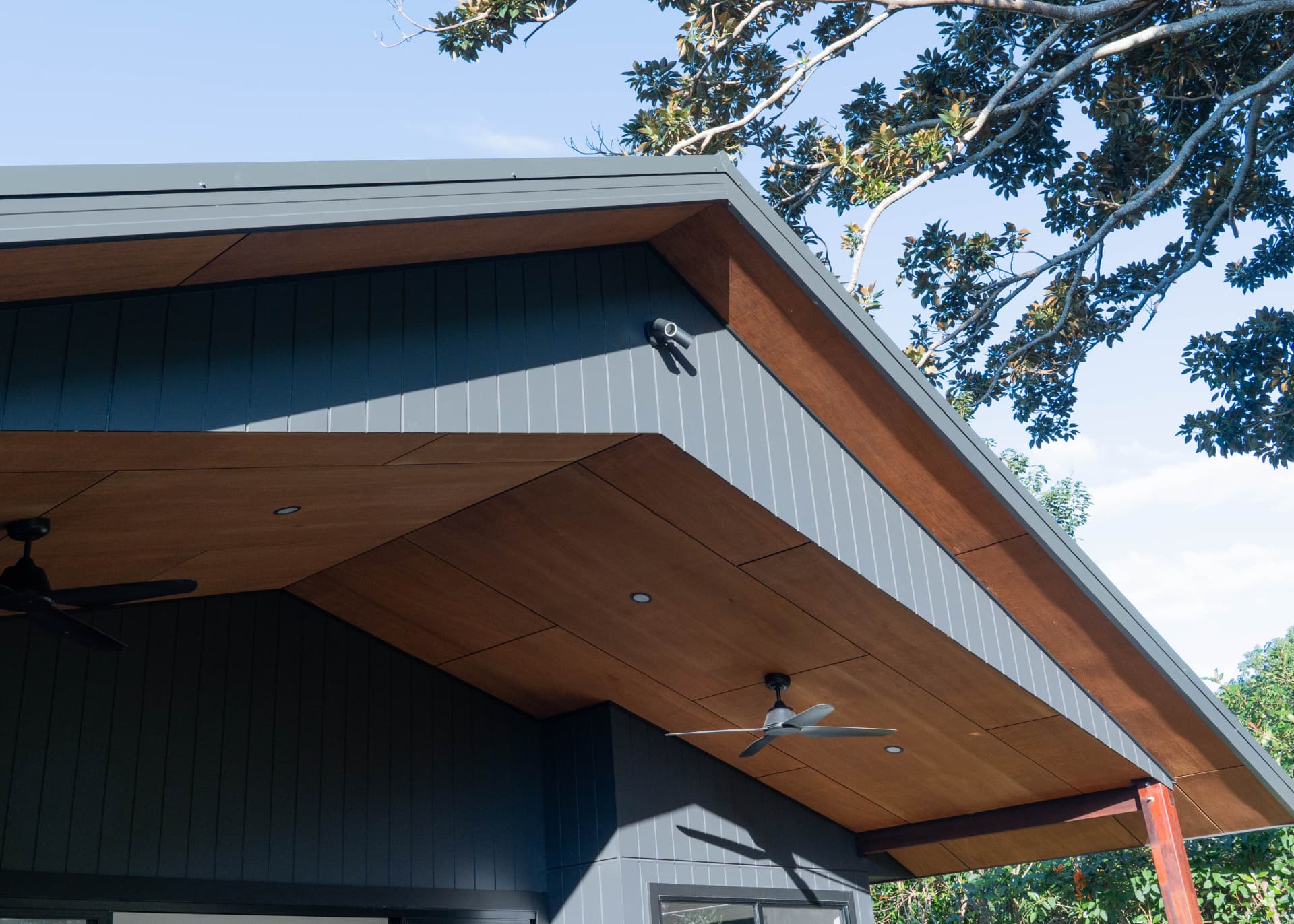 Hardwood-lined eave and roofline detail on a completed WSC build